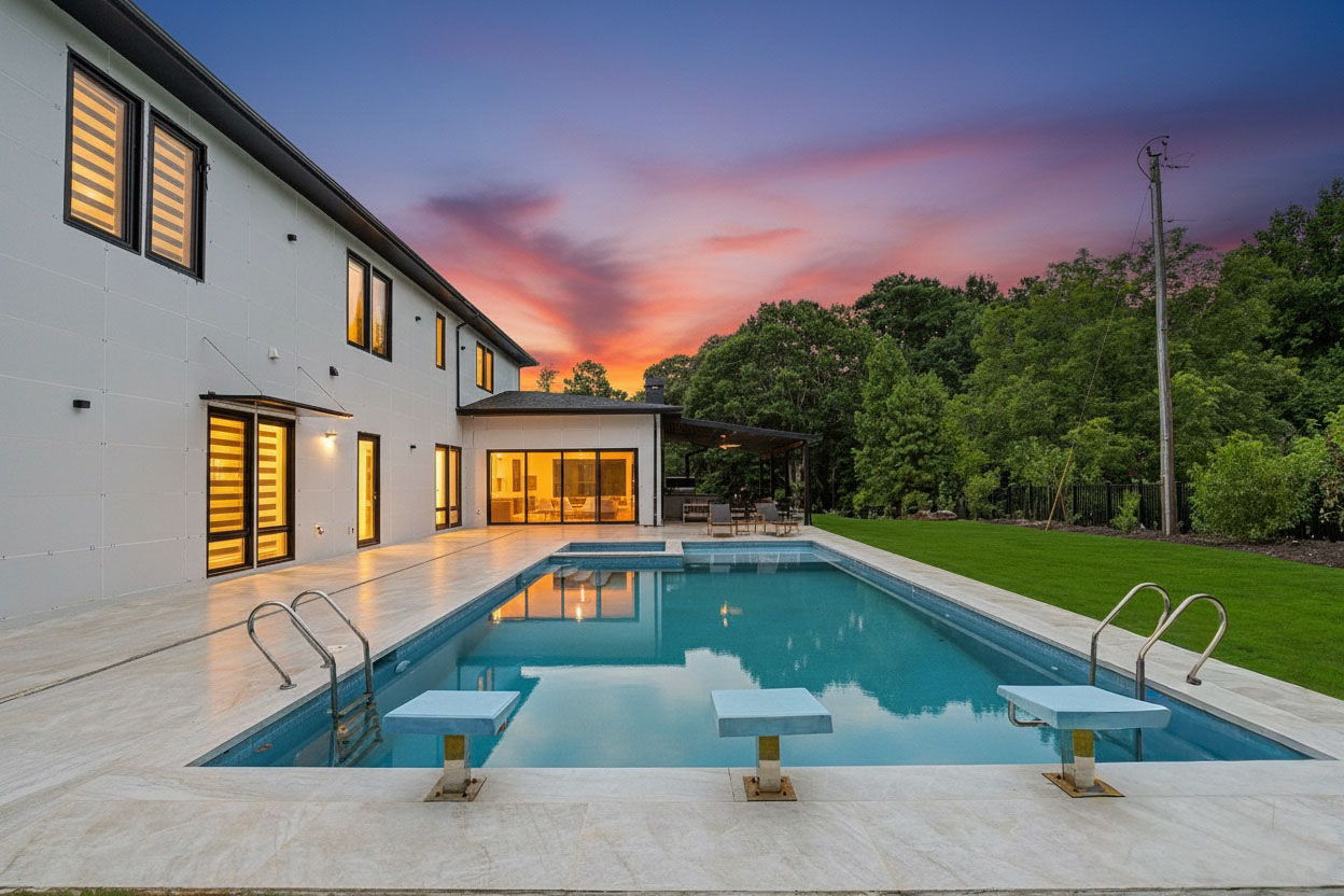 Resort-style pool at sunset